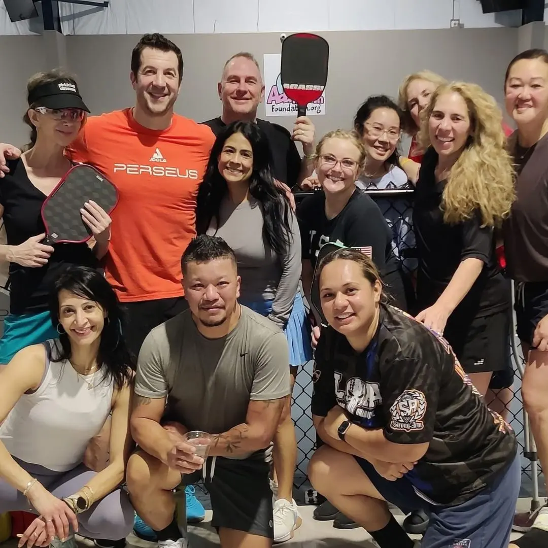 A team posing together after a corporate event