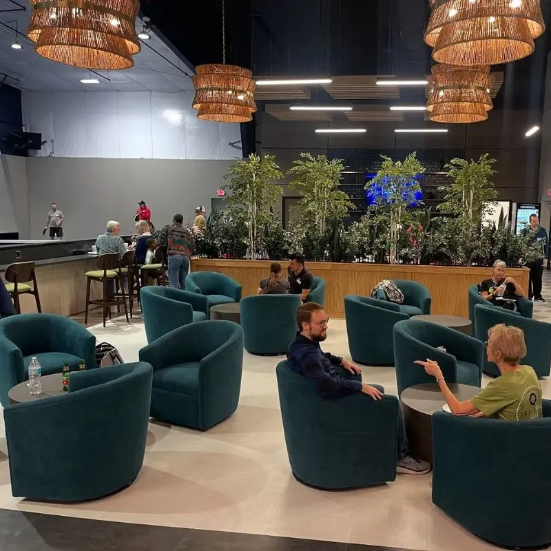 The PBZ lounge with seating and plants